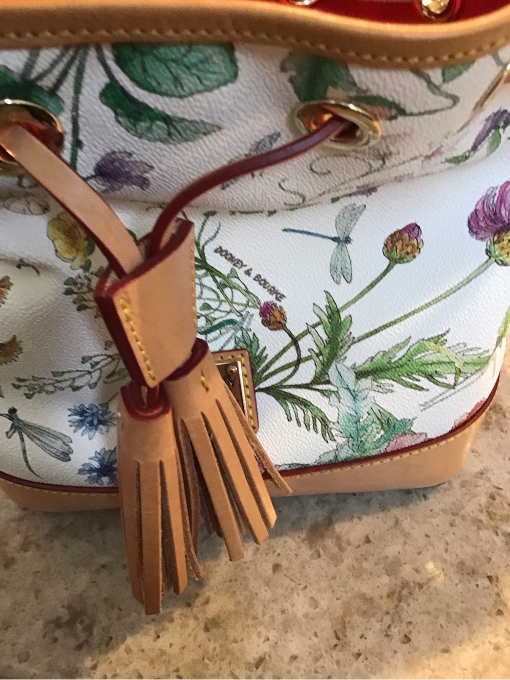 Dooney & Bourke White Floral Drawstring Tassel Bucket Bag with Tan Trim